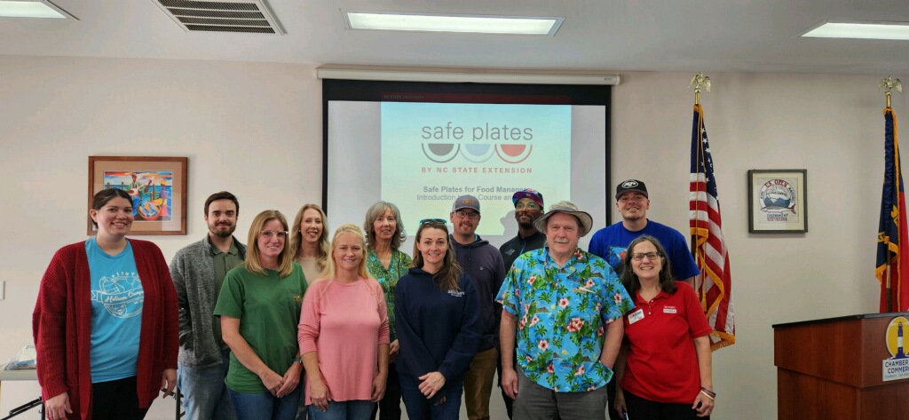 Participants of the recent Safe Plates class: Front row -- Melissa Marshall (Paradise Pineapple Grille Food Truck), Lisa Lewis (Brunswick Health and Rehab Center), Amanda Wright (Back2Shuckers, Oak Island), 
Willie Williams (Back2Shuckers, Oak Island), Cheryle Jones Syracuse (Food Safety Team Member, NC Cooperative Extension, Brunswick County). 
Back row -- Lillie Alverson (Bald Head Coffee, Boiling Springs Lakes), Avery Ashley (Family and Consumer Science Agent, Brunswick County Cooperative Extension Service), Nicole Harding (Southport Cheese Shoppe), Lori Tucker (Southport Cheese Shoppe), John Messer (Johnny Cheesehead Food Truck), Robert Smith (Mikes Bites, Bald Head Island), Mike Thomasen (Mikes Bites, Bald Head Island)