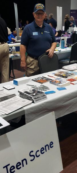 Gerald Decker at the Teen Scene Table, North Brunswick Chamber of Commerce Expo