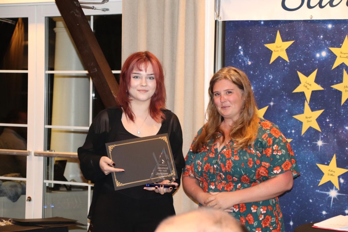 Our presenting sponsor, Brunswick County Arts Council, represented by President Sydnee Moore, presented the awards for High School Poetry and Art.   For art, the winner was Karleigh Karnes, a Senior (recent graduate) of South Brunswick High School.